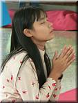 Mandalay Kuthodaw Paya Girl praying-cr-07.jpg